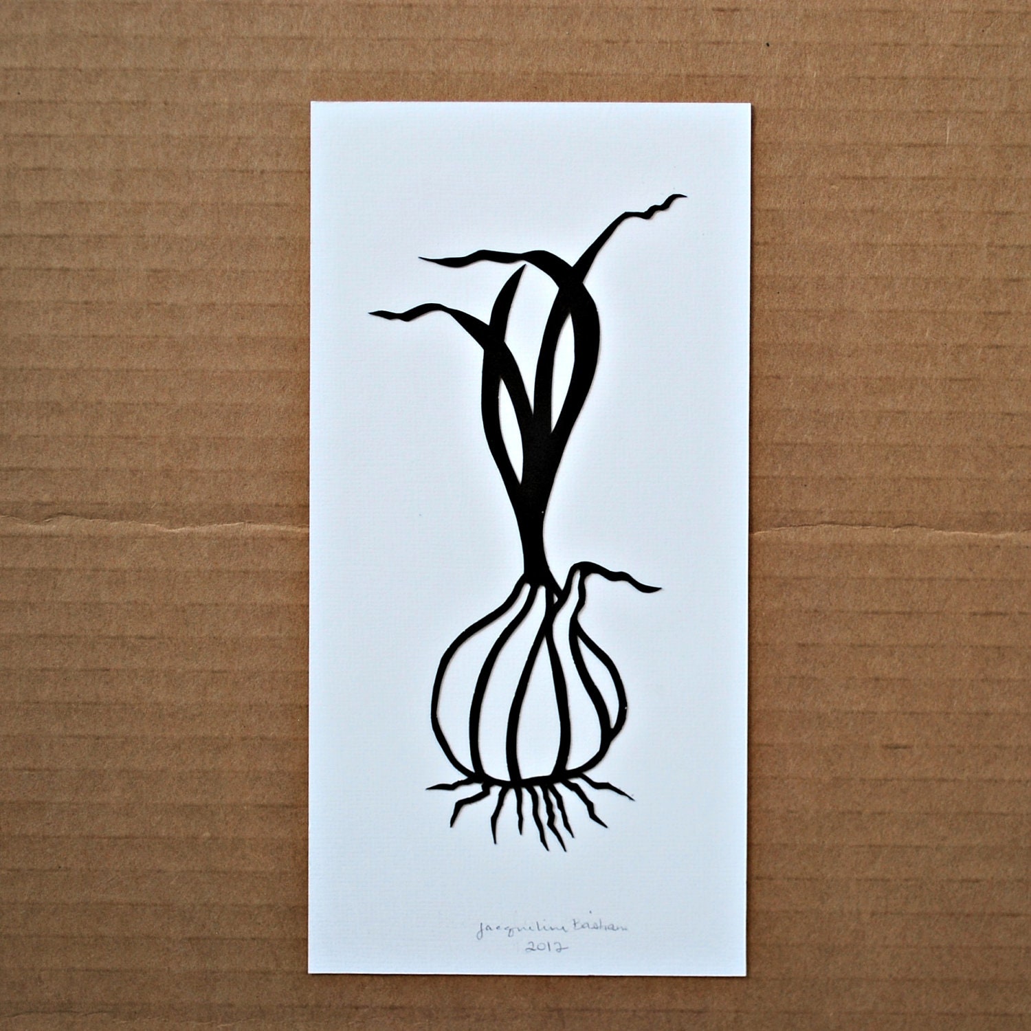 papercut illustration of garlic