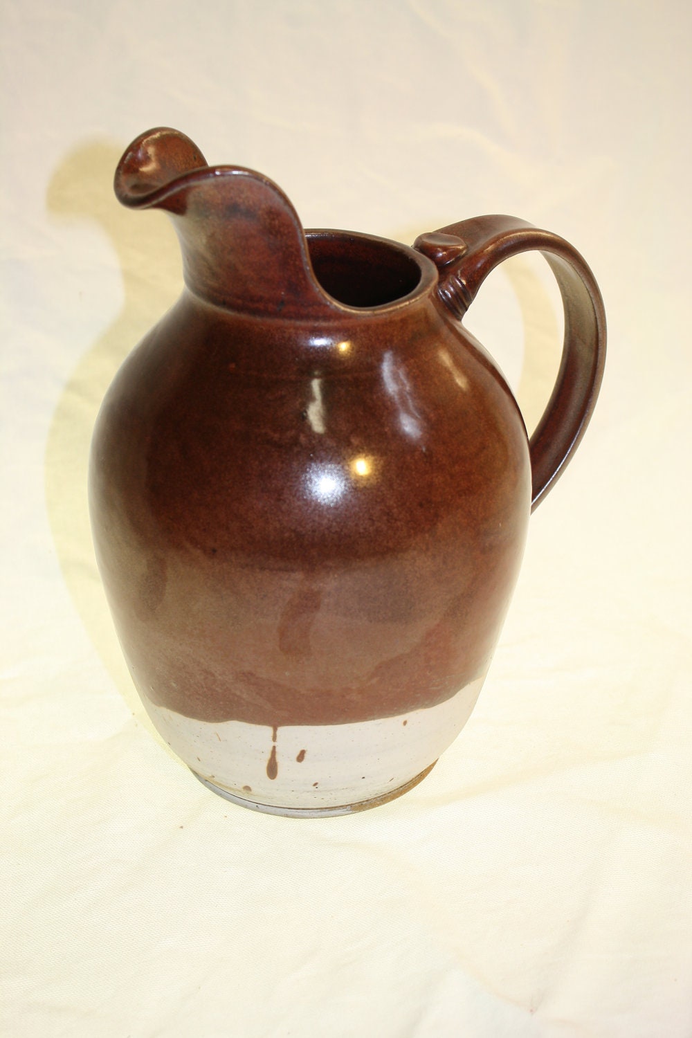 Red high fire ceramic pitcher