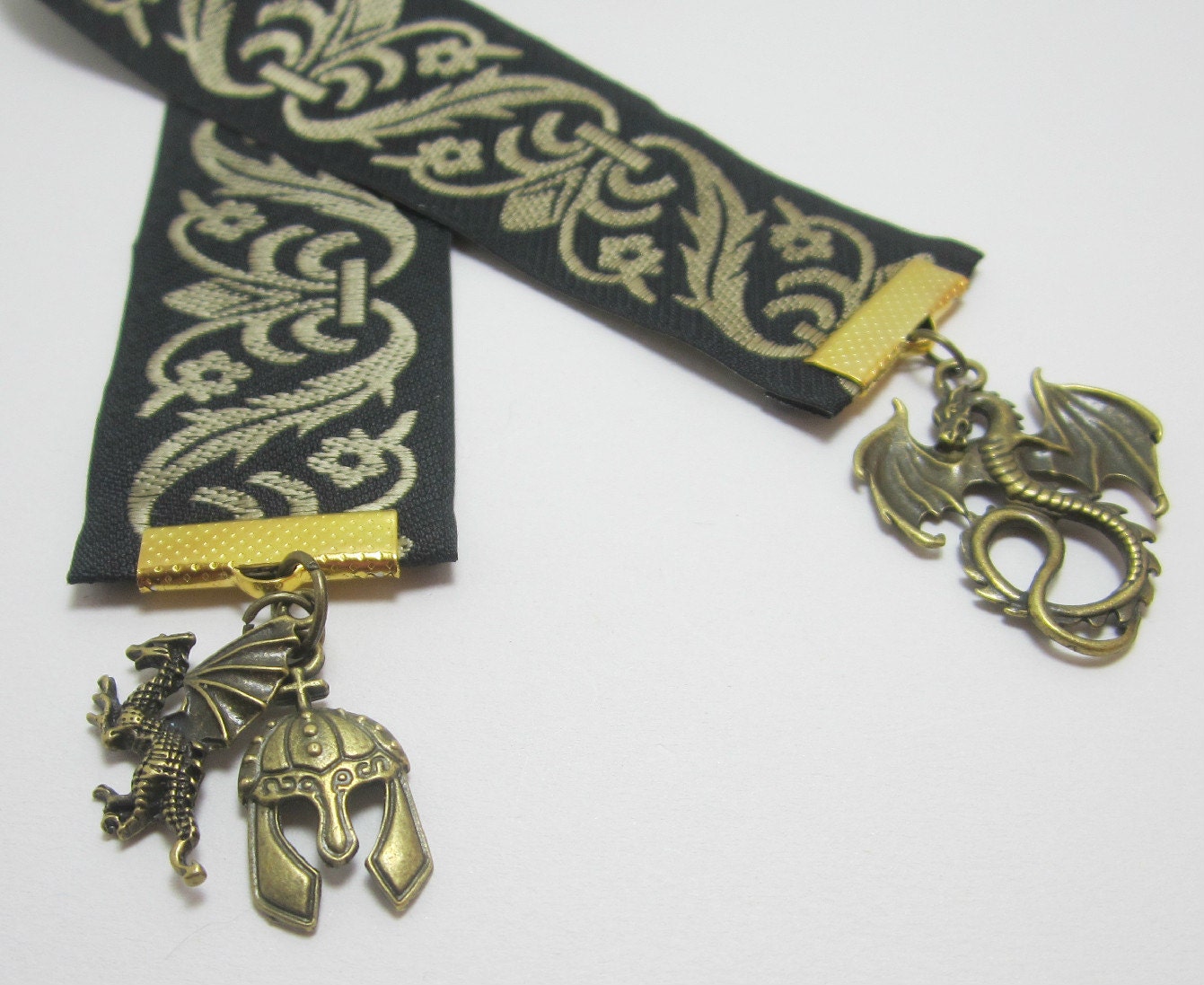 Bronze Scrolled Black Fantasy Aeonith Ribbon Bookmark with Dragons and Helmet Charms