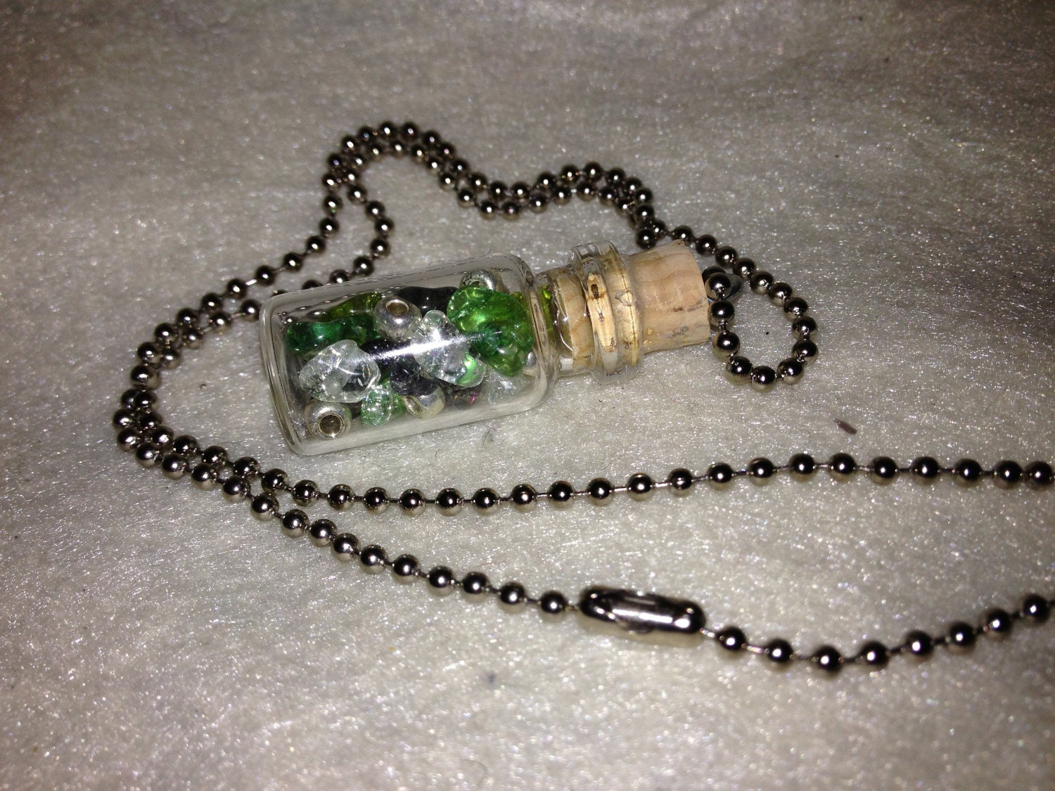 Mixed green crackle glass mini bottle pendant 