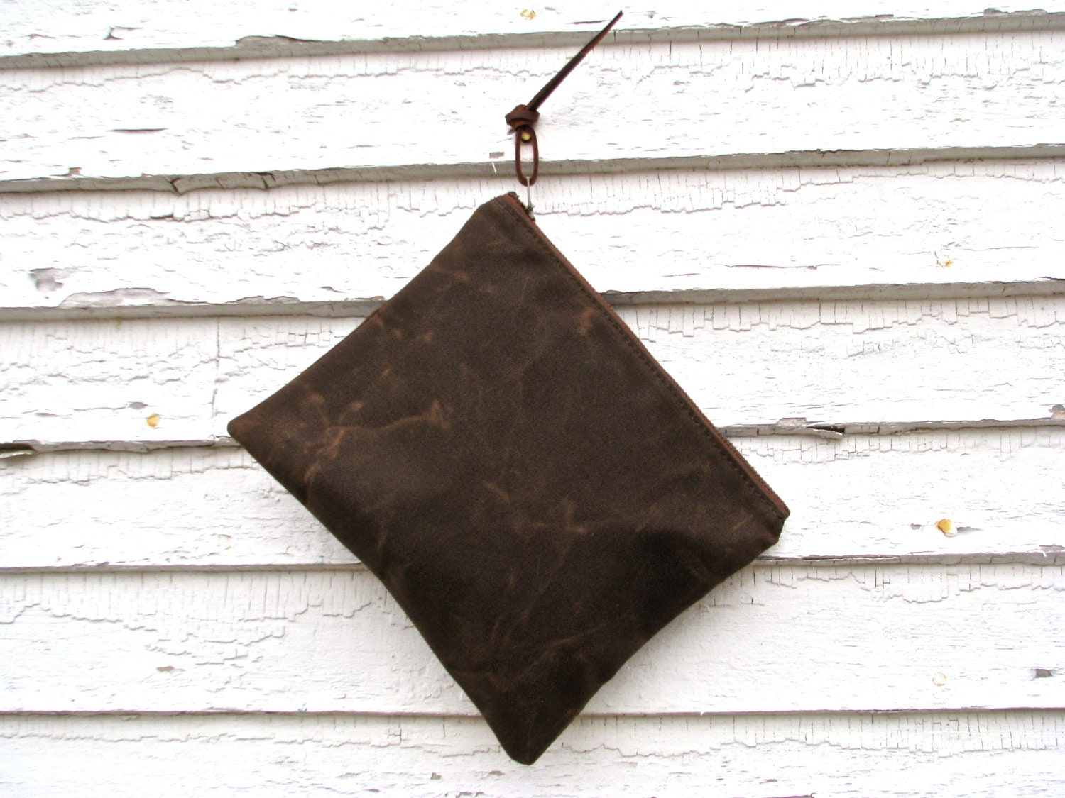 W A X E D . C A N V A S  / / / The MIDI  Clutch  / / /  medium sized dark brown waxed canvas clutch with brass zipper