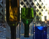 your choice, any color or size. self watering planters made from recycled wine bottles. great gift for spring flowers.