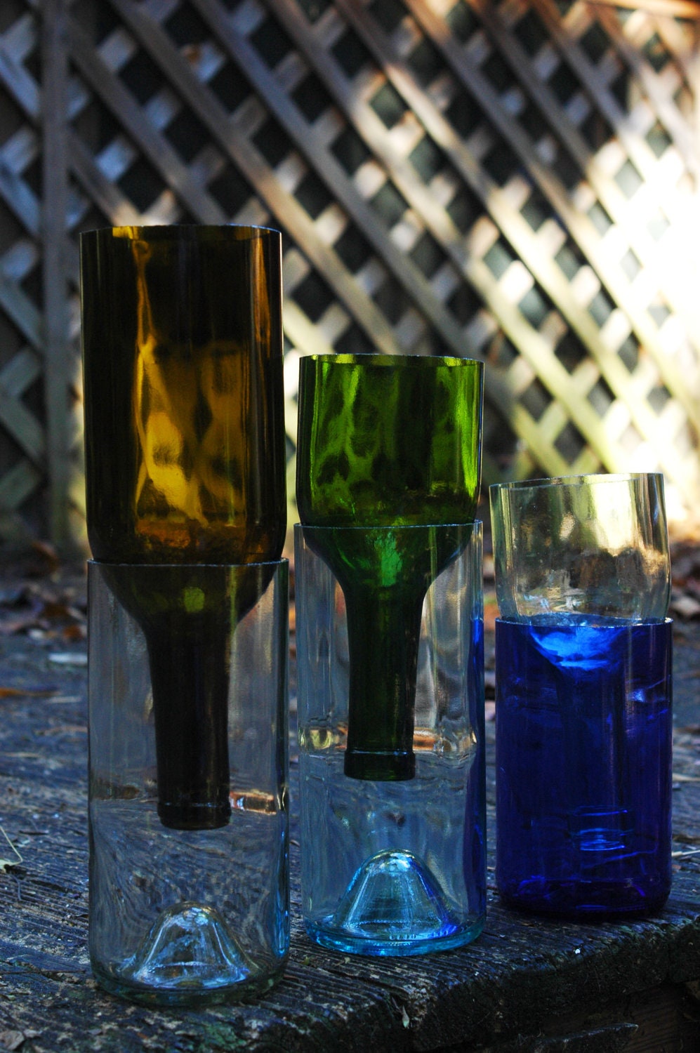 your choice, any color or size. self watering planters made from recycled wine bottles. great gift for spring flowers.
