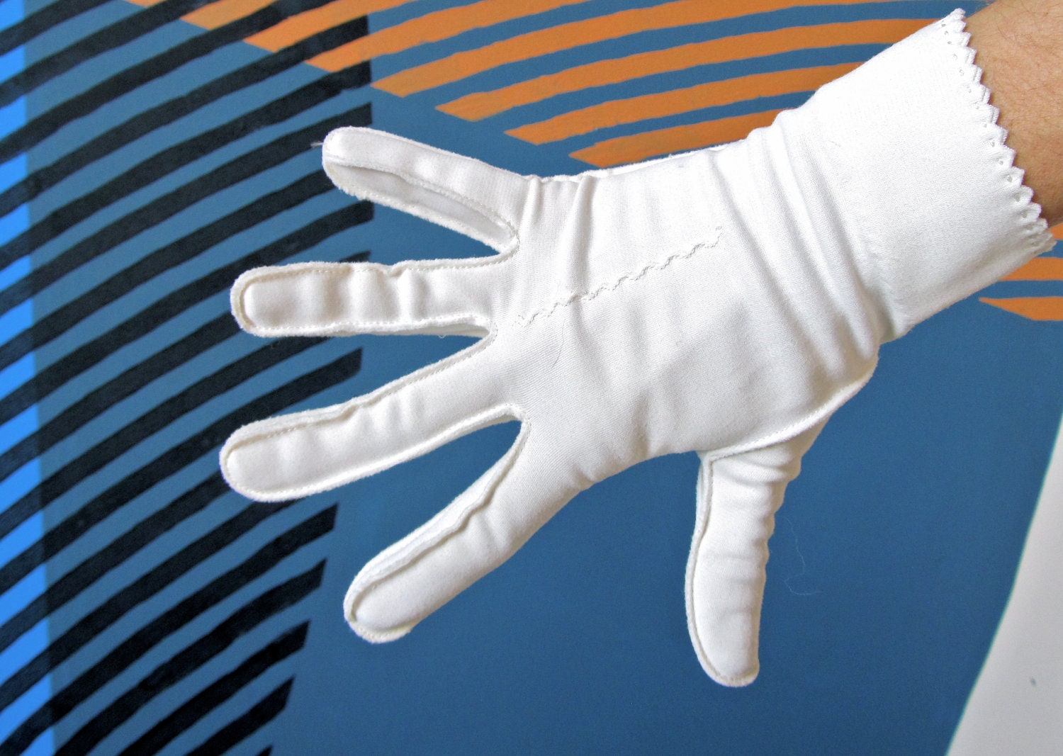 vintage 50s white nylon gloves with zig zag trim detail.