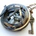 Sundial compass with brass colored chain and key. Fully operational. See photos, Great Christmas gift.