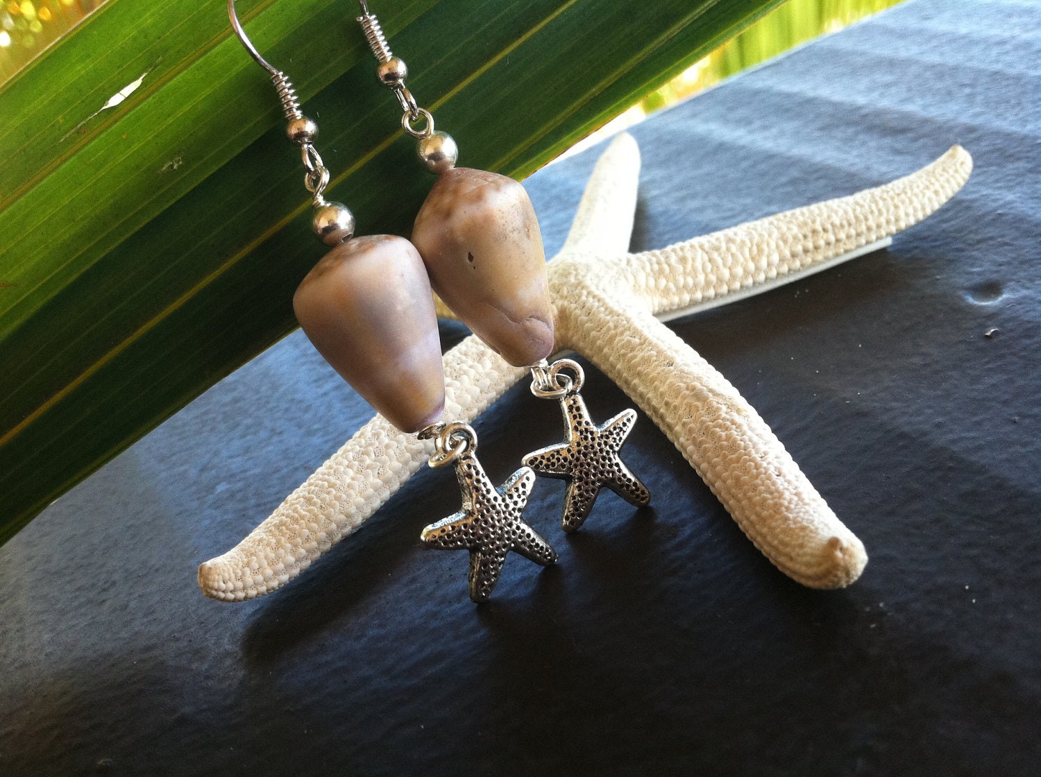 Small tribal cone shells with starfish silver charms