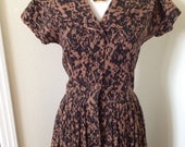 25% sale: 50s day dress in a black and brown print