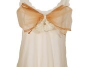 Upcycled vest top with twinkly over the top bow and tassel detail. Recycled fashion by Leylau
