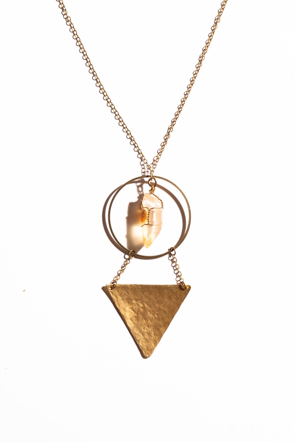 Spruce Ridge crystal necklace with hammered brass triangle