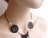 Black necklace filigree ornaments and crystals- A trist with Beardsley