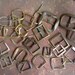 25 Vintage BELT BUCKLE DESTASH. various sizes, metals, brass, goldtone...