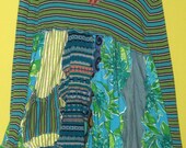 Upcycled cotton knit long sleeve sweater in cool colors fits large Xl