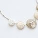 Light beige Necklace with cat