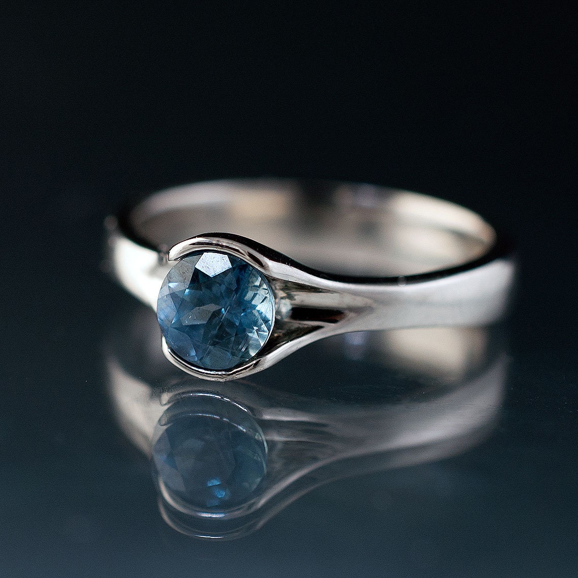Blue Sapphire Engagement Ring, Round Cut Fold Half Bezel Solitaire in Silver/Palladium - Fair Trade Gemstone