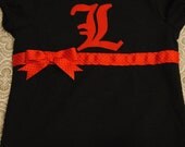 Variety of Teams Available.  Unversity of Louisville Ribbon Onesie or Shirt