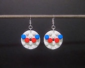 White disk earrings with red and blue pieces and silver plated ear wires