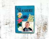 vintage book picture frame. READABLE vintage book as unique photo frame. By the Seashore, 1973. children's kid's book ocean sea shells