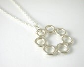 Feminine sterling silver circle charm necklace, unique handmade silver jewelry, art silver jewelry
