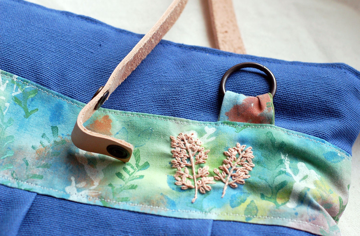 Green and blue fields - handpainted and embroidered pleated tote bag in royal blue - Herbarium Collection