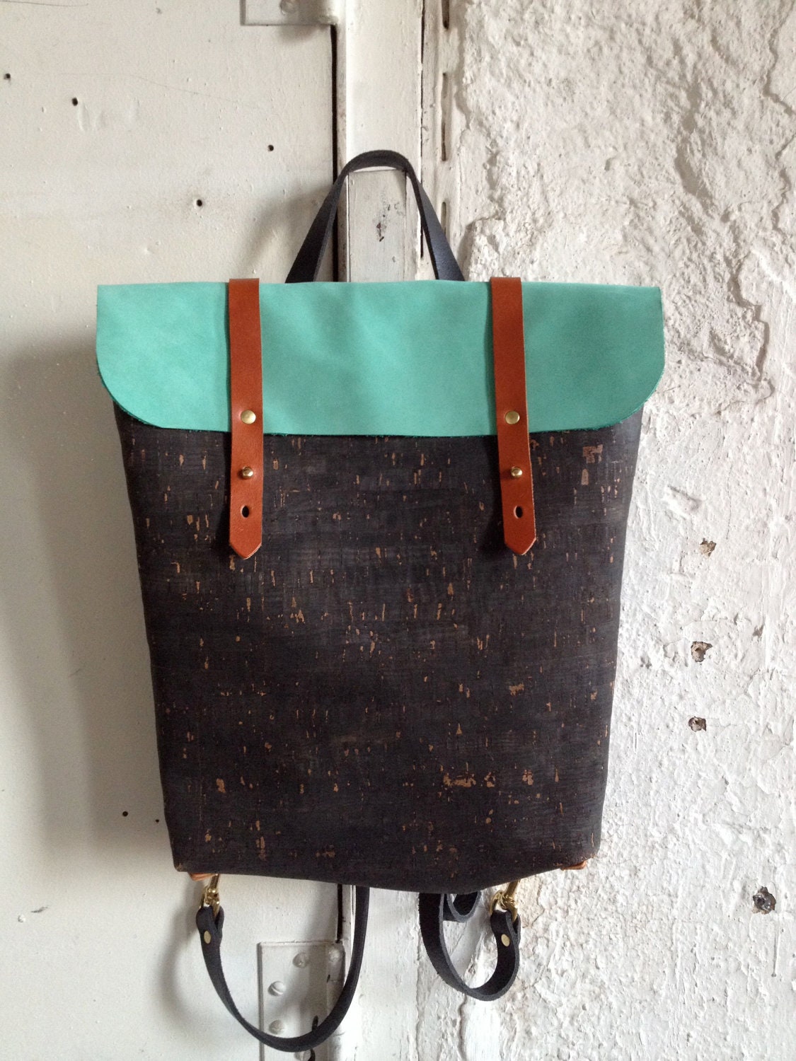 black cork and teal leather rucksack