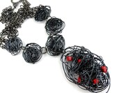 Stylish  wire pendant necklace with gemstones. Unique stylish  modern  by Fashion Brand Faina.