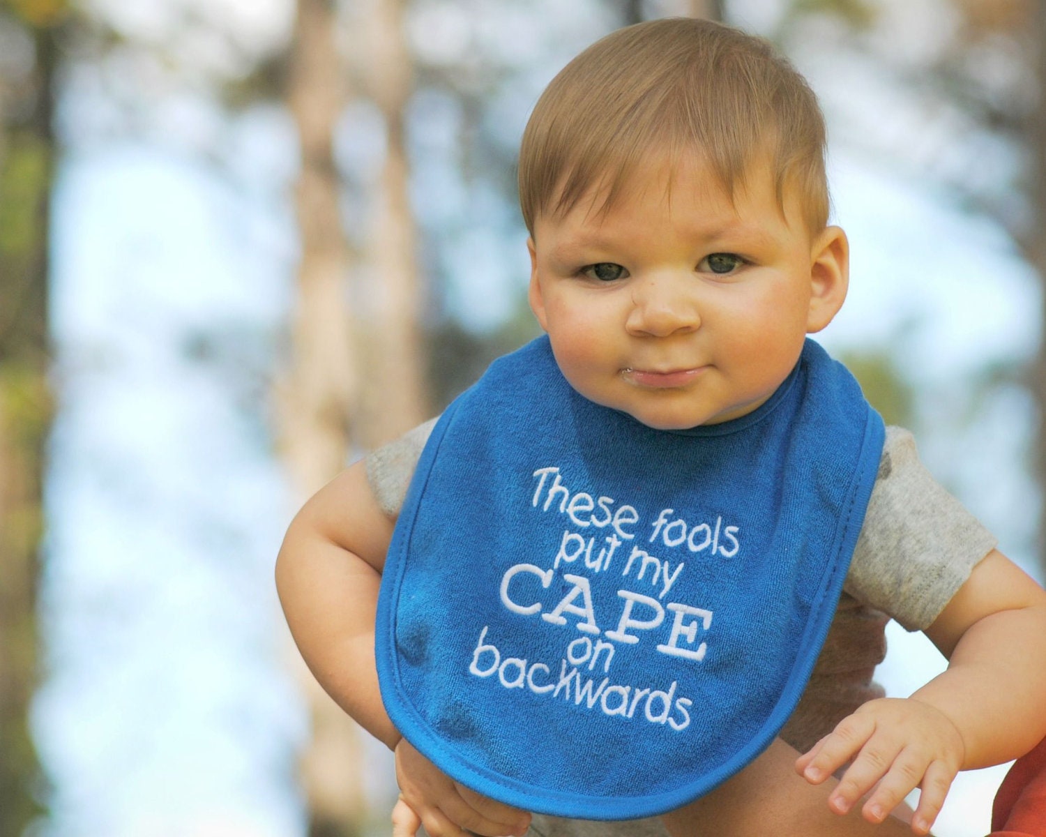 These Fools Put My Cape on Backwards Bib Royal Blue White