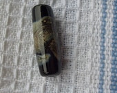 SALE    Handmade Focal Bead,  Black and Silvered Ivory Shard Wrapped