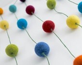 Rainbow Wool Ball Garland on Green Cotton Cord