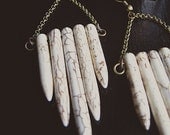 the DEVIL'S TEETH howlite SPIKE earrings