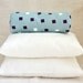 Teal blue bolster pillow cover with pixel design