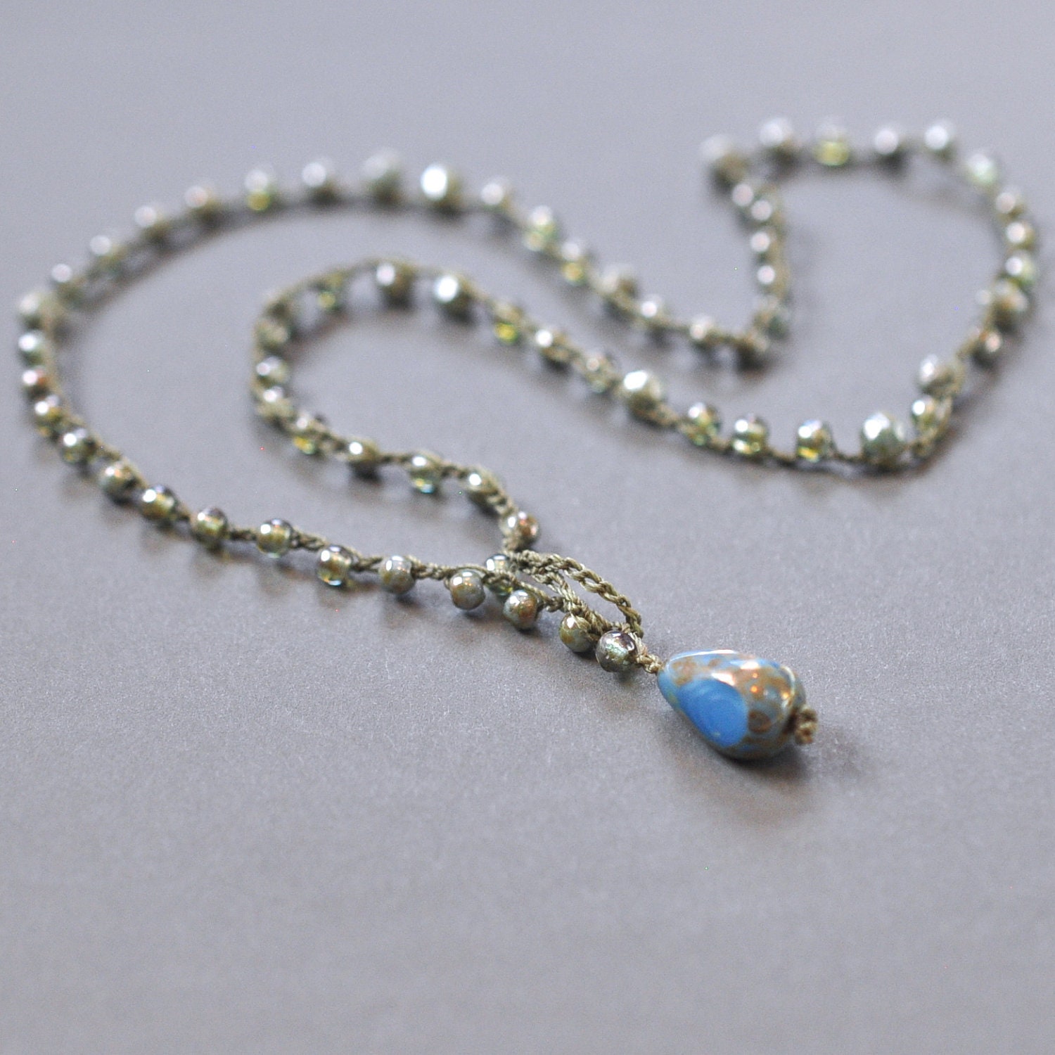 Crochet jewelry Indigo Luster crocheted beaded lariat necklace with drop pendant