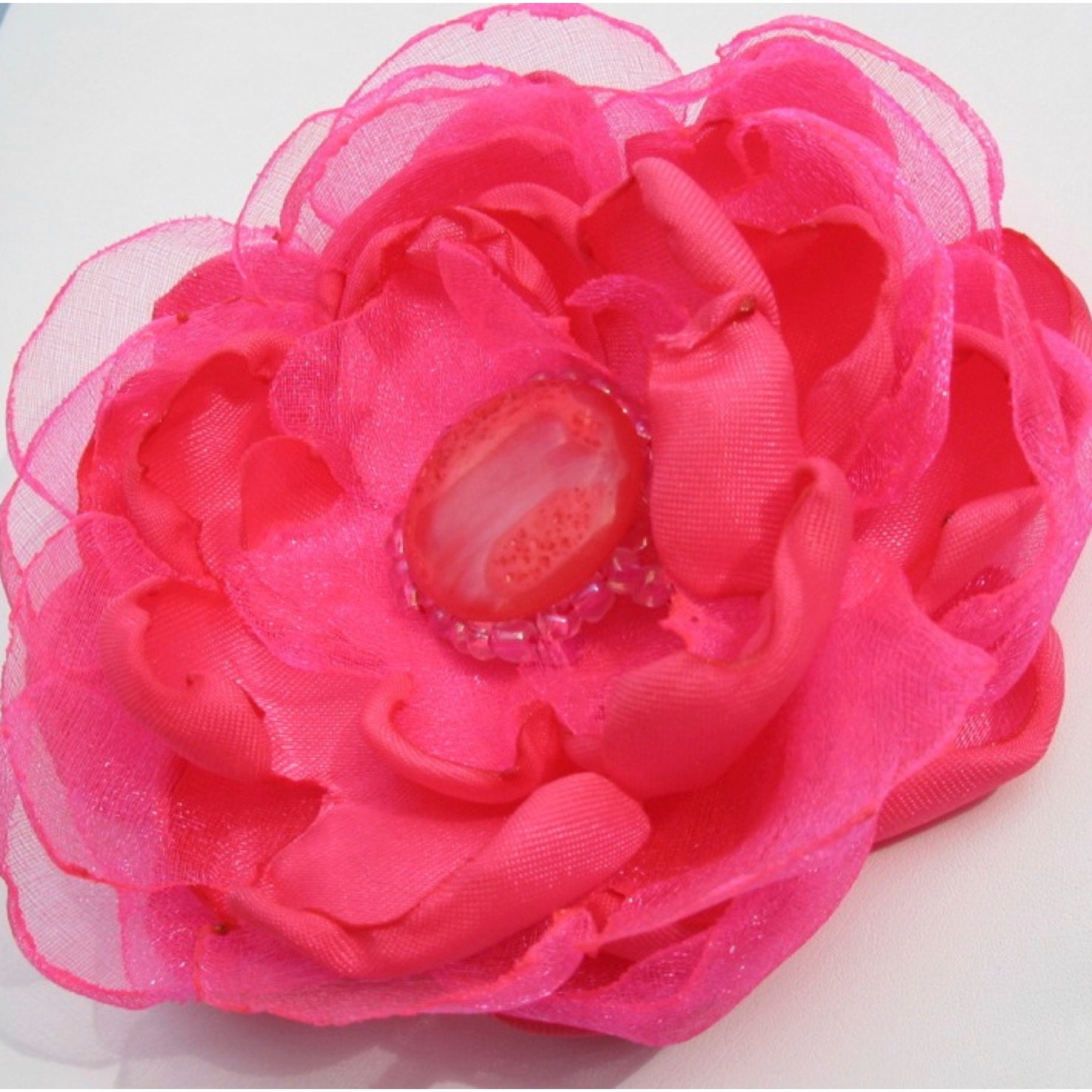 PENELOPE.possibilities. hot pink organza and satin flower it is a brooch pin. barrette. headband and more