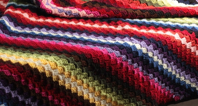 crocheted blanket, afghan, diagonal multicolor stripes, rainbow stripes,
