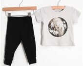 Infant Moon Outfit, full moon graphic with crescent, metallic silver foil screenprint, soft grey short sleeve shirt and black baby pants