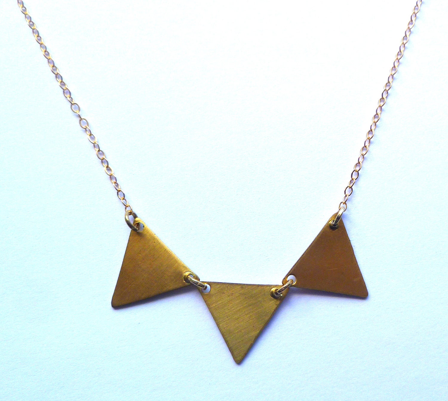 Bunting necklace, three mini brass triangles on a thin gold fill chain