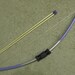Sm. Bow  age 3-7, 5 extra arrows - lavendar and silver or purple & silver