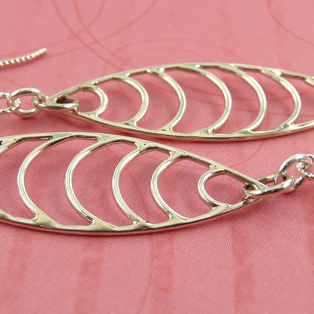 Stylish Fish earrings, sterling silver and clear Swarovski crystals, marquise shape