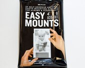 24 Adhesive Photo Sleeves. Perfect to add to your Ruby Love Modern Baby Memory Book
