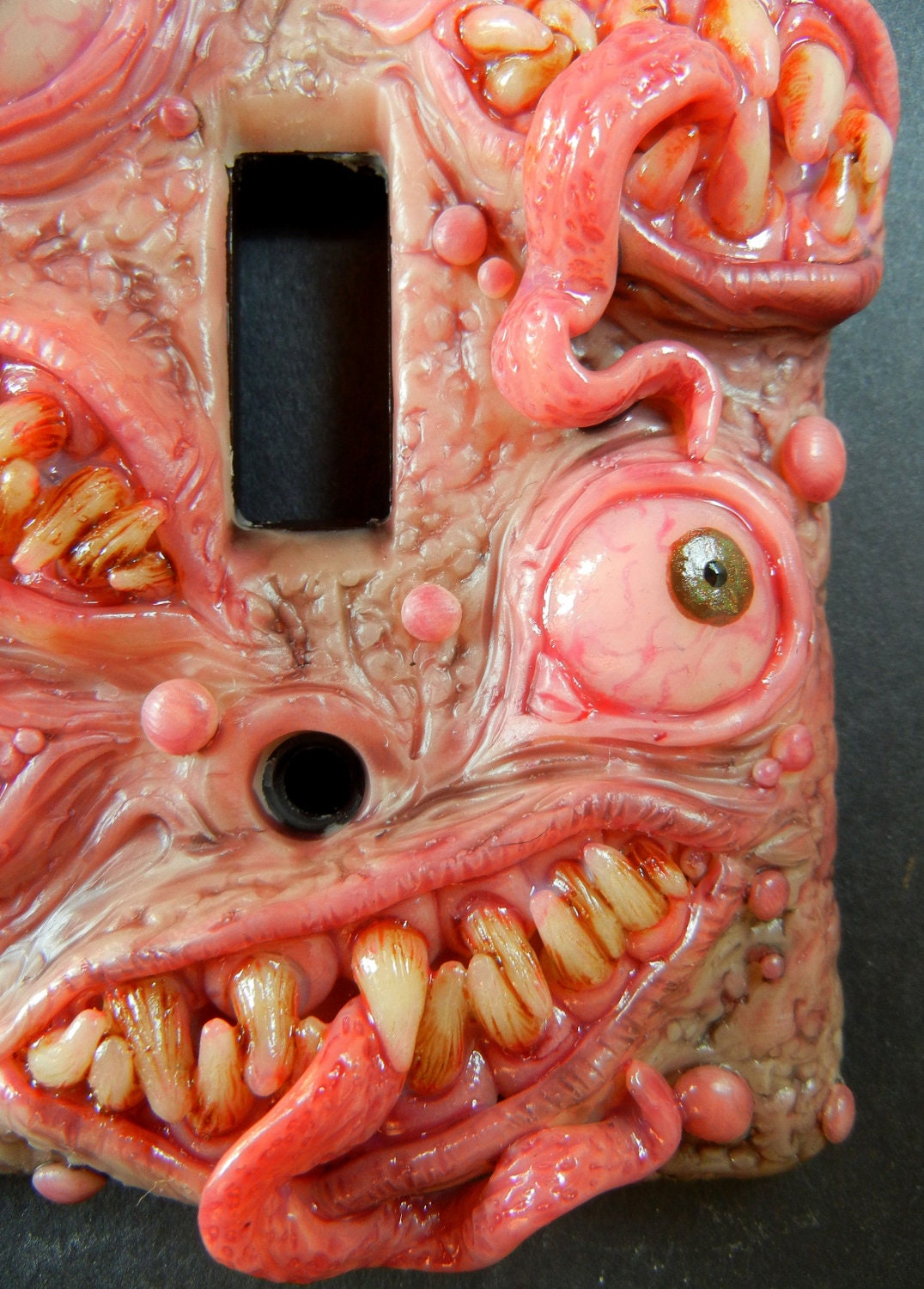 polymer clay switchplate Bitey McToothcrunch