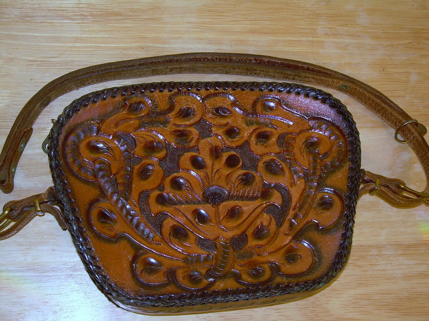 Vintage Tooled Leather Purse has adjustable Strap