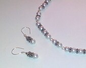 Bridal pearls at first glance. Linked pearl necklace and earring set.