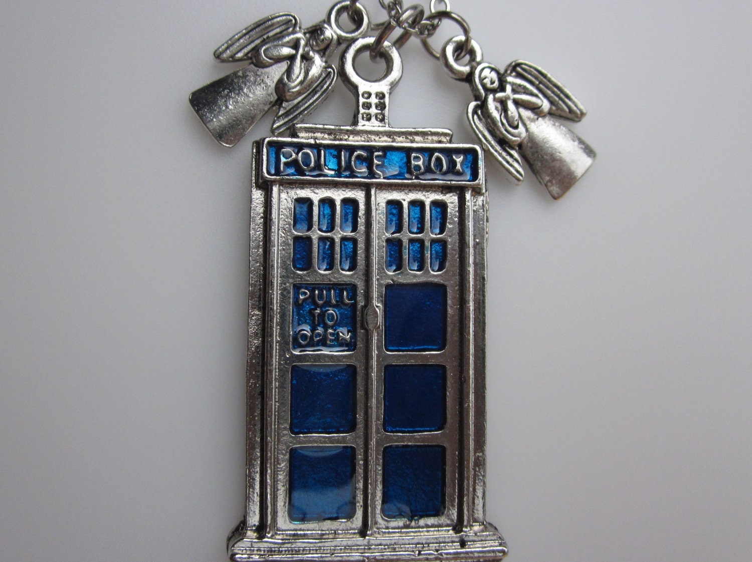 DONT BLINK. Police Box Necklace with Weeping Angels