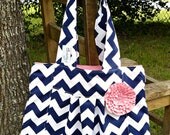 NEW, The "Lora".....Navy and Pink chevron pleated purse with Pink rosette