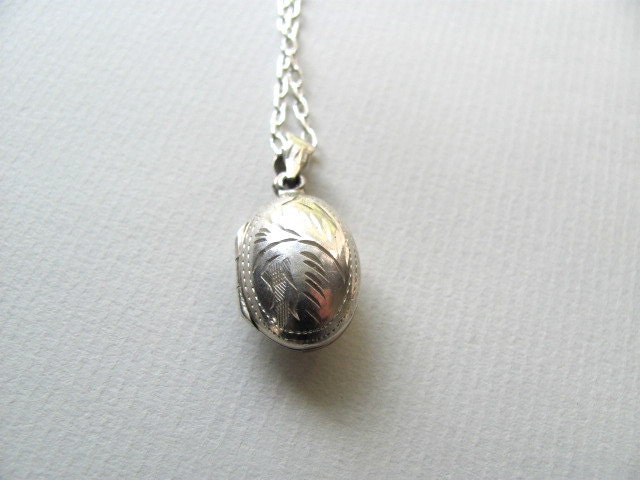 Sterling silver petite oval vintage photo locket, engraved on silver chain, small antique locket
