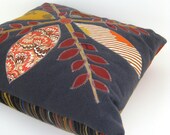 Appliqued Pillow with Orange and Red Leaf Pattern