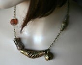 Brass vintage Tibetan bell and brass African bead necklace