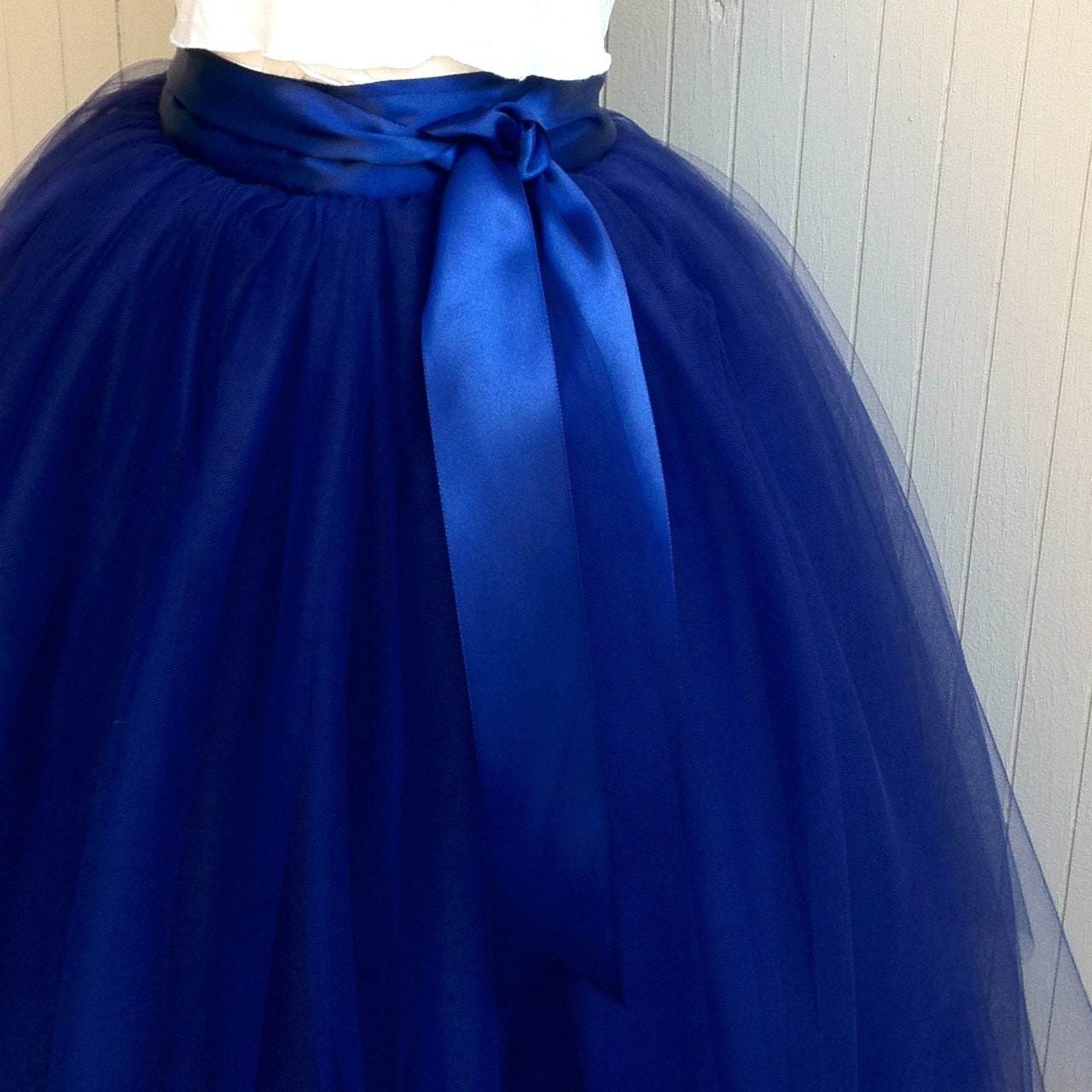 Navy blue tulle skirt tutu for women lined in black satin with a navy satin ribbon waist.