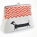 Dachshund purse with orange chevron on linen