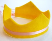 eco friendly lexa felt crown with adjustable ribbon tie. avail in 22 felt colors.  as seen on glo.msn.com & dailycandy.