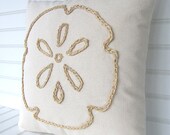 Sand dollar raffia pillow for your coastal living beach house